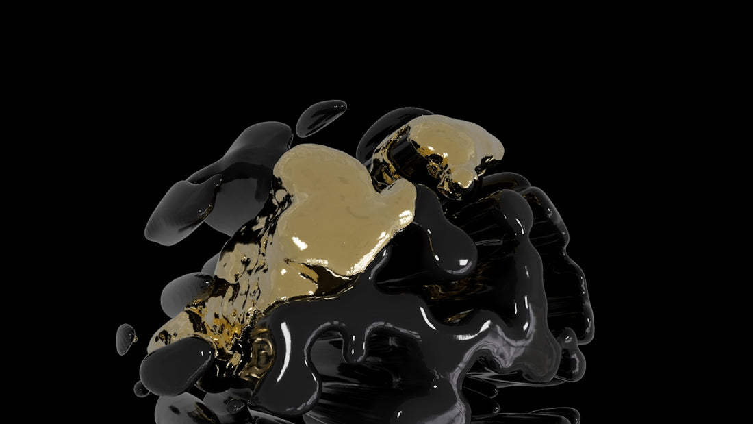 Black and gold liquid is splashing in the air.